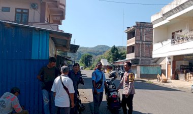 Bhabinkamtibmas-Sambangi-Pasar-Impres-Reo,-Sampaikan-Imbauan-Kamtibmas