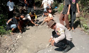 Bhabinkamtibmas-Satarmese-Barat-Bersama-Warga-Gelar-Kerja-Bakti-di-Wae-Cepang.
