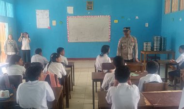 Dukung-Program-Nasional,-KBO-Sat-Binmas-Polres-Manggarai-Hadiri-Launching-Makan-Bergizi-Gratis-di-SMPN-1-Ruteng-–-Cancar
