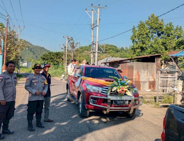 POLSEK REO LAKSANAKAN PENGAWALAN DAN PENGAMANAN PROSESI SAKRAMEN MAHA KUDUS CORPUS CHRISTI, RATUSAN UMAT KATOLIK IKUTI PERARAKAN DENGAN KHIDMAT