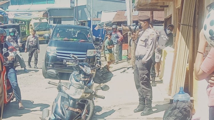 Tanggap Serius Covid - 19, Sat Samapta Terus Imbau Pedagang Di Pasar.