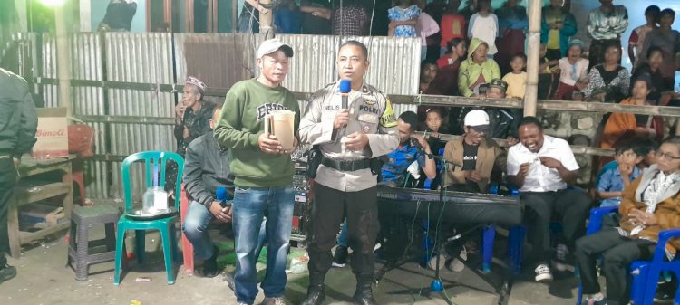 Bhabinkamtibmas Rahong Utara Berikan Himbauan Dalam Acara Pengumpulan Dana