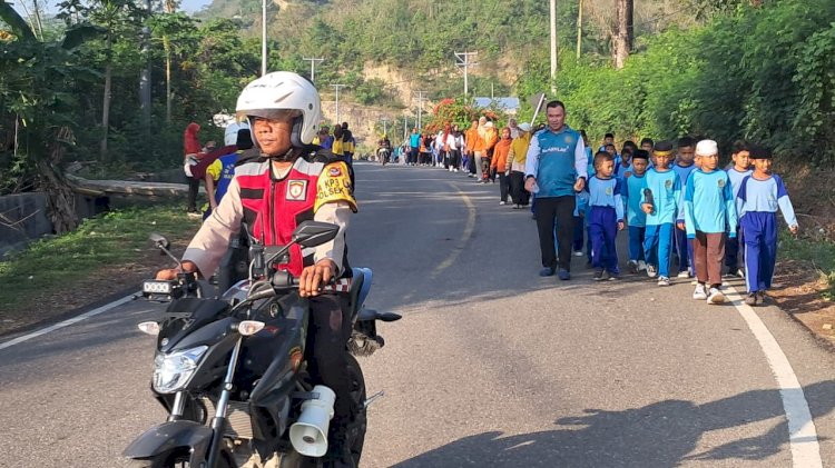 POLSEK REO LAKUKAN PENGAMANAN KEGIATAN JALAN SEHAT DALAM RANGKA HARI SANTRI NASIONAL 2025