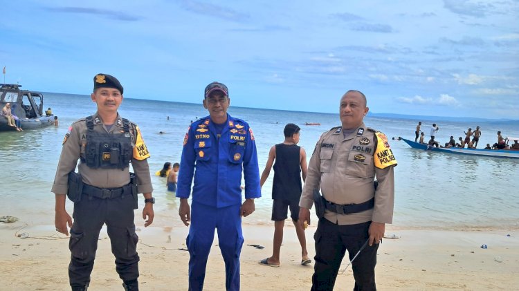 Menjaga Keamanan dan Kenyamanan Masyarakat Pasca Libur Tahun Baru, Personel Polsek Reo, Bhabinkamtibmas dan Sat Polairud Laksanakan Pengamanan di Pantai Torong Besi