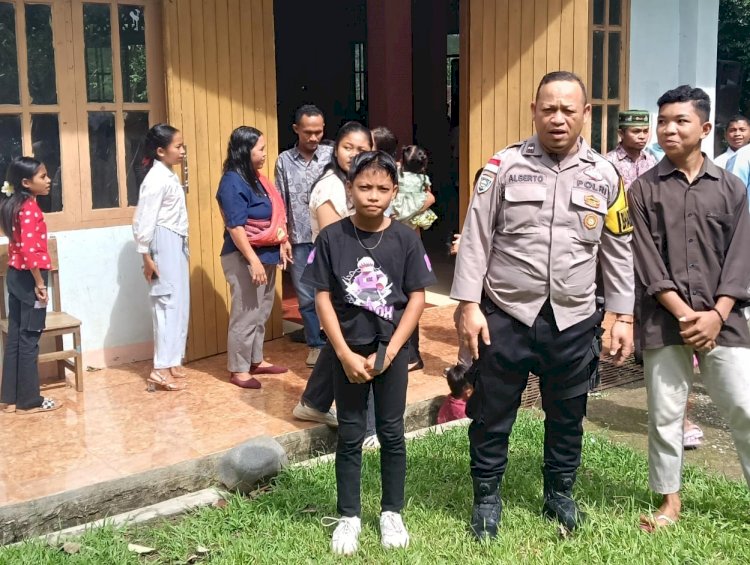 Bhabinkamtibmas Kelurahan Bangka Leda Laksanakan Giat Minggu Kasih di Gereja St. Mikhael Beanio
